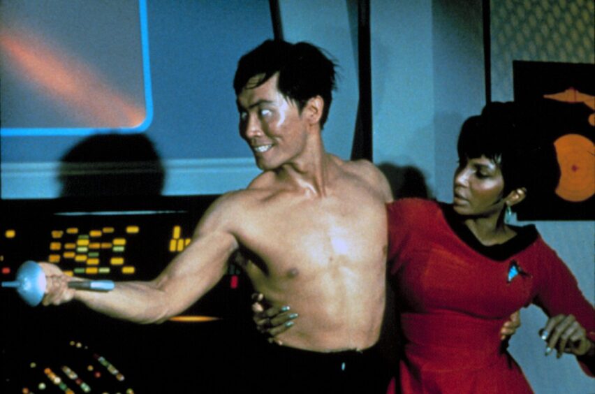 With Nichelle Nichols on the set of the sci-fi series in 1966.