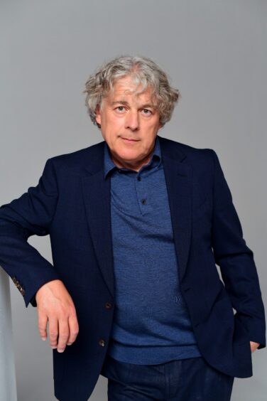 Alan Davies.