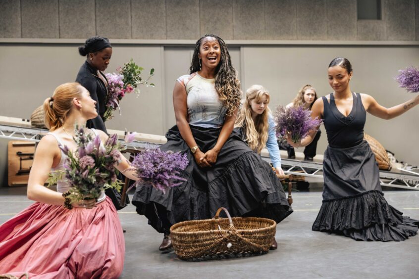 Danielle, centre, in rehearsals.
