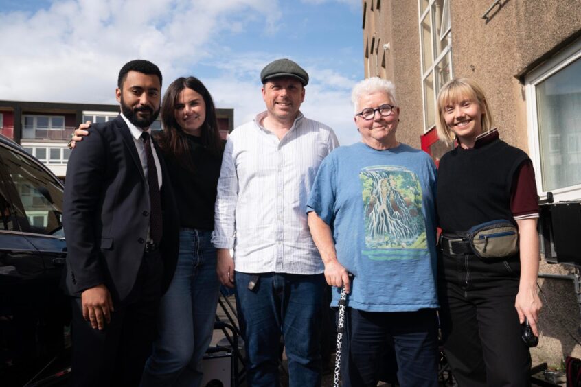 Zach Wyatt, Emer Kenny, director Gareth Bryn, Val McDermid and Lauren Lyle on set.