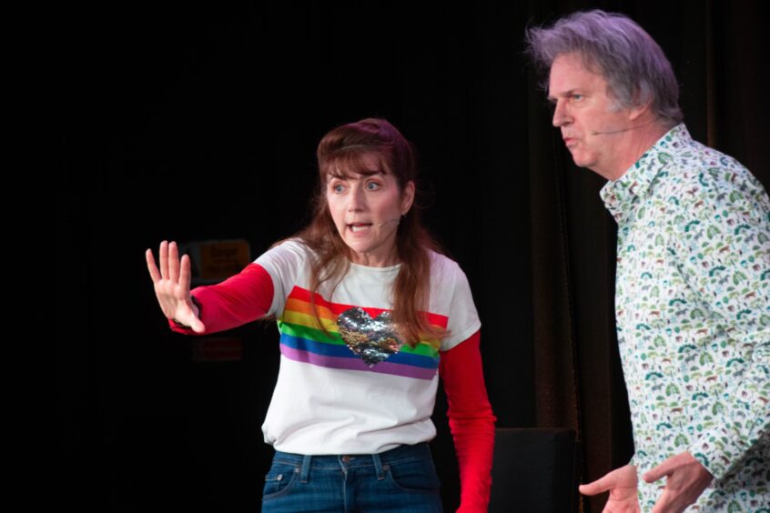 Paul Merton and Suki Webster on stage.