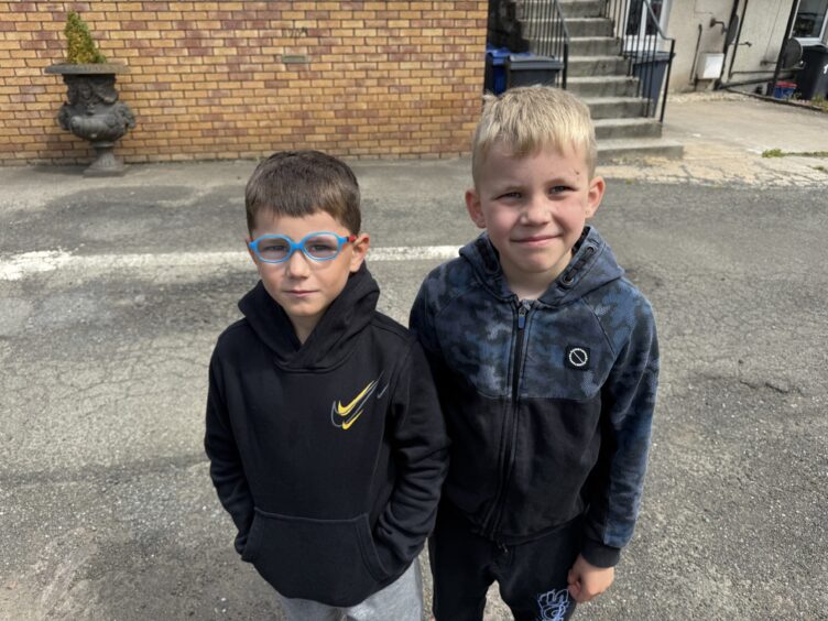 Wyatt and Hunter Harcus have suffered because of seclusion at school, according to their father.
