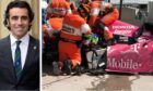 Dario Franchitti, left, and rescuers at his car after the IndyCar crash in Houston, 2013.