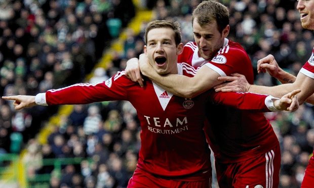 Peter Pawlett celebrates netting a famous Parkhead winner for Aberdeen against Celtic in 2015