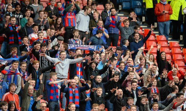 Inverness Caley Thistle fans celebrating.