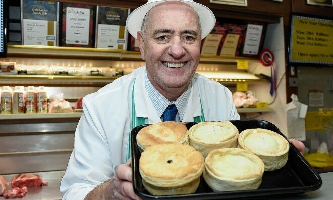 Alistair Bruce of Bruce of the Broch holding a tray of pies