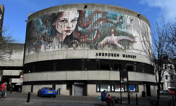 "Because You Are That Light" mural at Aberdeen Market.