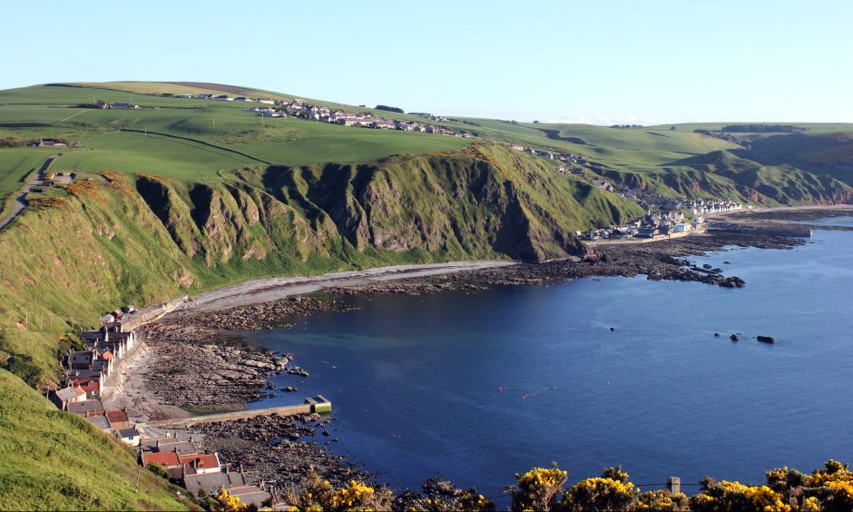 Picture taken with Crovie in foreground and showing the walk round the Sneuk to Gardenstown