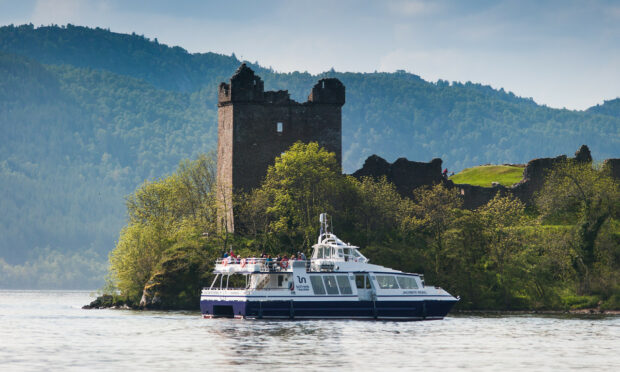 Loch Ness by Jacobite boat in front of Urquhart Castle