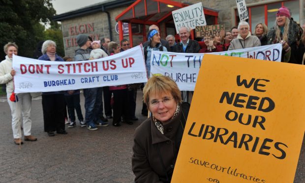 Campaigners pressed to save libraries across Moray in 2013.