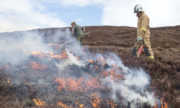 Iain Hepburn carrying out controlled burning.