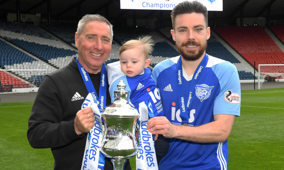 Peterhead manager Jim McInally and Ryan Dow celebrate promotion to Ladbrokes League 1 in 2019. Image: SNS