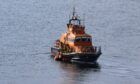 Wick Lifeboat rescued a stranded fisherman.