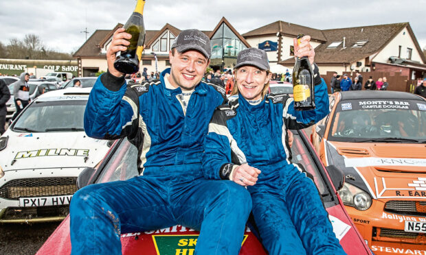 Winners of the 2020 Snowman Rally, Michael Binnie with co-driver Claire Mole, celebrate.