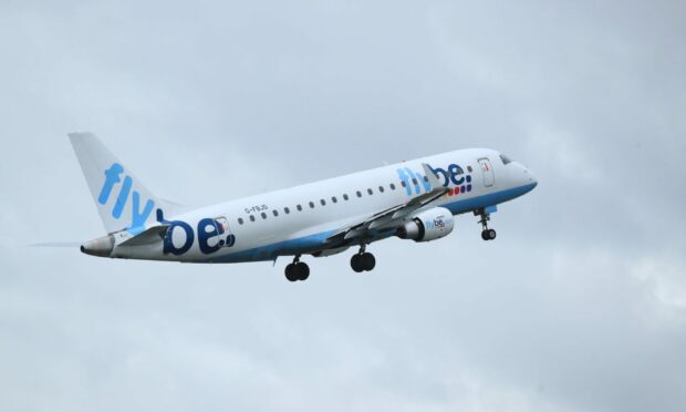 File photo dated 13/01/20 of a Flybe flight departing from Manchester Airport as the struggling airline is on the brink of collapse. PA Photo. Picture date: Thursday March 5, 2020. See PA story AIR FlyBe. Photo credit should read: Peter Byrne/PA Wire