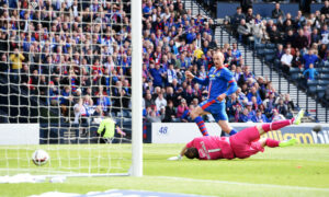 James Vincent slides home the goal that won Caley Thistle the Scottish Cup.