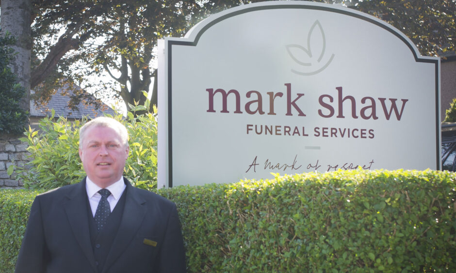 Mark Shaw, one of many Aberdeen undertakers offering non traditional funeral provisions pictured outside his funeral home.