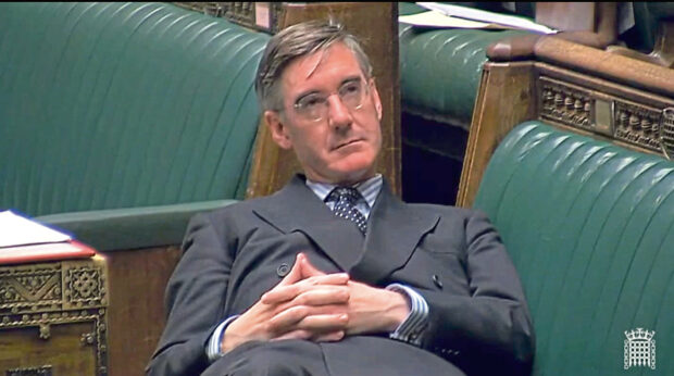 Jacob Rees-Mogg reclining in the House of Commons last year.