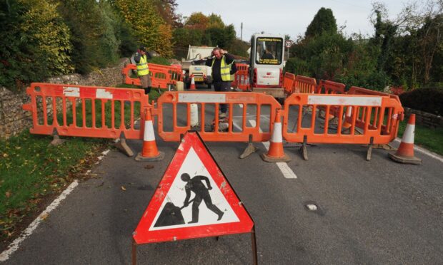 A generic image of a road closed by roadworks