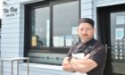 Pictured is The Bay Fish and Chip Shop owner Calum Richardson. Image: Darrell Benns.