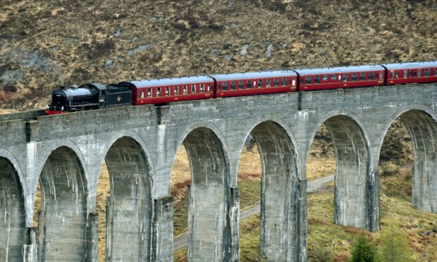 Jacobite steam train on the Glenfinnan Viaduct