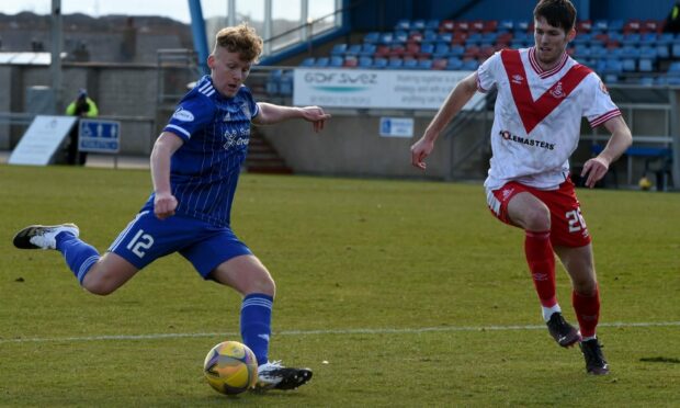 Peterhead midfielder Andrew McCarthy, left, will miss the first six weeks of the season. (Photo by Kenny Elrick/DCT Media)