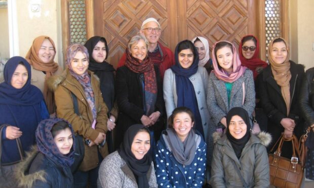 John and Lorna Norgrove with Afghanistan scholarship students.