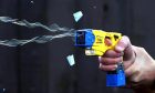 A taser gun was used by police officers.