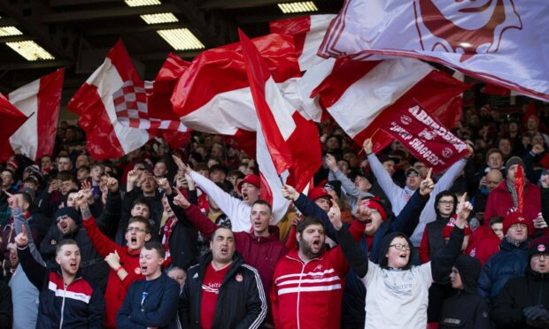 Aberdeen supporters rock Pittodrie in the Scottish Cup prior to the coronavirus pandemic.