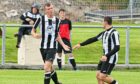Kieran Simpson, left, celebrates with Scott Barbour after scoring Fraserburgh's third against Keith in the Evening Express Aberdeenshire Cup