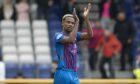 Manny Duku applauds the Inverness fans during a game against his previous club Ratih Rovers. Image: SNS Group