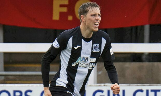 Kane Hester celebrates his opening goal against Albion Rovers