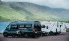 North Coast 500 motorhome stop with parking signage at Applecross
