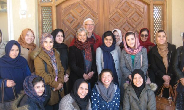 John and Lorna Norgrove with Afghan students which their foundation has helped.