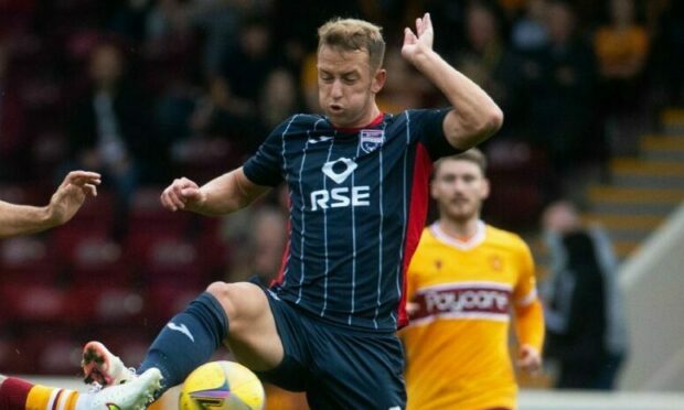 Ross County star Harry Paton in action against Motherwell.