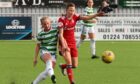 Celtic's Maria Olafsdottir Gros and Chloe Gover of Aberdeen compete for the ball on the opening day of the SWPL1 season.