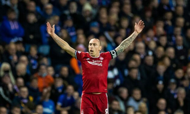 Scott Brown of Aberdeen celebrates his goal against Rangers at Ibrox.