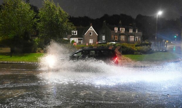 Flooding has been reported at the Bridge of Dee roundabout in Aberdeen. Photo: Chris Sumner/DCT Media