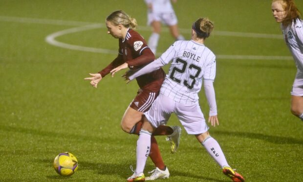 Aberdeen's Lauren Gordon and Hibs' Rachael Boyle. Picture by KATH FLANNERY