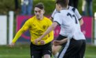 Seamus McConaghy, left, in action for former club Nairn County has joined Strathspey Thistle