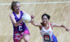 Scotland's Claire Maxwell (left) and Samoa's Soli Ropati battle for the ball during the Netball World Cup match at the M&S Bank Arena, Liverpool.