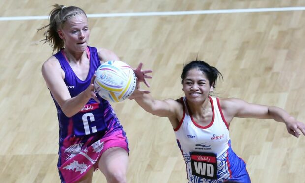 Claire Maxwell in action for Scotland at the 2019 Netball World Cup in Liverpool. Image: PA.