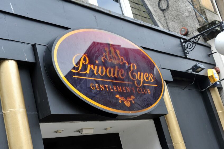 The sign that reads Private Eyes Gentlemen's Club outside the Inverness venue.