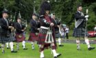 Massed Pipes &Drums entertain the crowds, at the Elgin Highland Games.
Pic By: Bobby Nelson