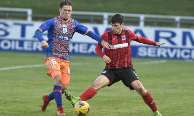 Elgin City's Rory MacEwan, right, has just made his 100th appearance for the Moray club.