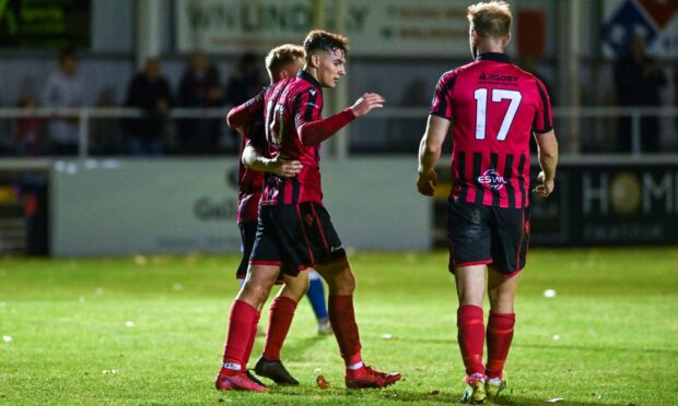 Kieran Shanks celebrates Inverurie's second goal.