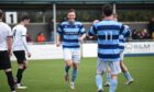 Lachie Macleod celebrates scoring the fifth goal for Banks o' Dee in their resounding 5-0 victory.