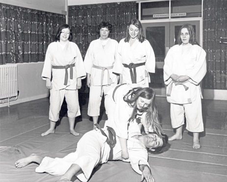 Aberdeen University women’s judo team and coach Harry Black