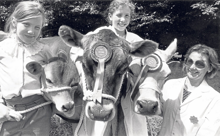 Catherine (left), 8, and Fiona, 12, Mackinnon, of Wester Lochagan, Banff, with their Jersey cows