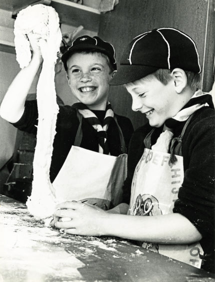 1987: Cub Scouts Andrew Riddell and Andrew Cameron visited Andy Leiper’s bakery